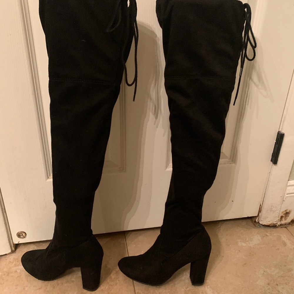 Thigh high black boots